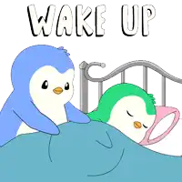 two penguins are laying on a bed with the words wake up written above them