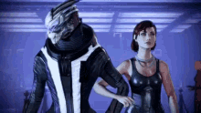 a man and a woman are standing next to each other in a video game