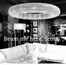 a black and white photo of a living room with the words " beam me here scotty " on the bottom