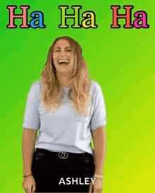 a woman is laughing in front of a green background that says " ha ha ha "