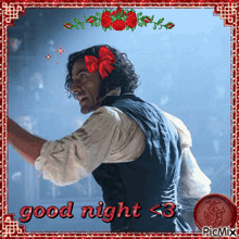 a picture of a man with a red bow on his head says good night