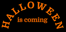 a sign that says halloween is coming in orange letters on a black background