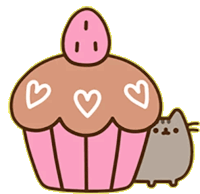 a cupcake with three hearts on it and a cat behind it