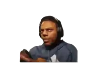 a man wearing headphones and a blue adidas sweatshirt
