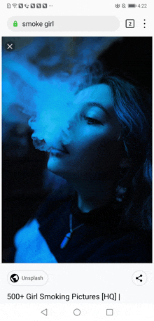 a phone screen shows a picture of a woman smoking a hookah