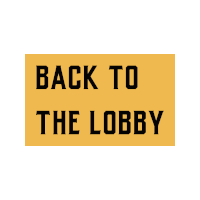 a yellow sign that reads back to the lobby