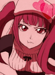 a girl with pink hair and red eyes is wearing a pink hat with hearts on it .