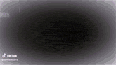 a black background with a circle in the middle