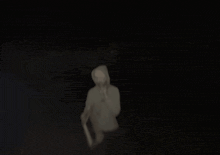 a blurry picture of a man in a hooded jacket