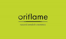 a logo for oriflame natural swedish cosmetics on a green background