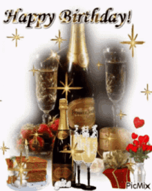 a happy birthday card with a bottle of champagne and glasses