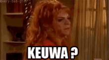 a woman with red hair is asking the question keuwa