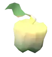 a yellow apple with a green leaf on top of it