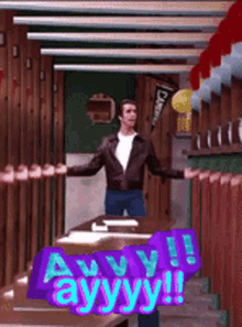 a man is standing in a room with a sign that says ayyy !