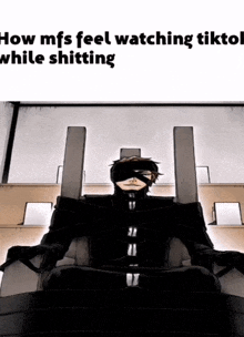 a man in a black suit is sitting in a chair with a caption that says how mfs feel watching tiktok while shitting