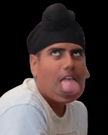 a man wearing a turban sticks out his tongue