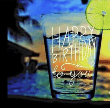 a glass of water with the words " happy birthday to you " on it