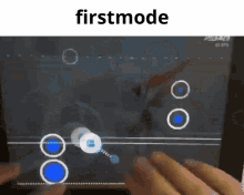 a person is playing a video game on a tablet with the words firstmode above them