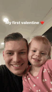 a man and a little girl are posing for a picture and the caption says " my first valentine "