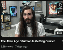 a video of a man with long hair and a beard is titled the aksu age situation is getting crazier