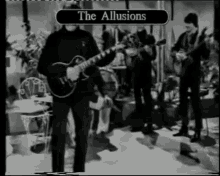 a black and white photo of a man playing a guitar with the words " the illusions " on the bottom