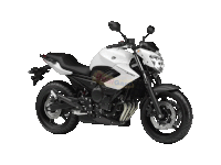 a white yamaha xj6 motorcycle with a black seat