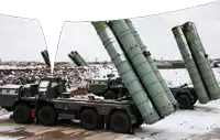 several military vehicles are parked in the snow and one of them has a red sticker that says ' s-300 ' on it