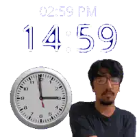 a man with glasses stands in front of a clock that reads 1459