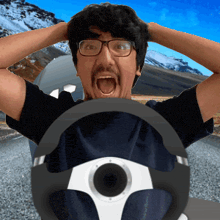 a man with glasses and a beard is driving a car