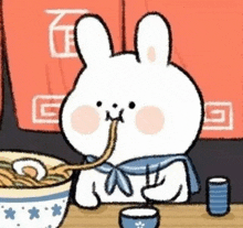 a rabbit is eating noodles from a bowl at a table .