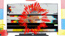 a tv with a colorful image on it