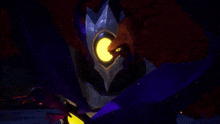 a close up of a monster with a yellow eye and a sword in a dark room .