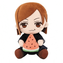 a stuffed toy of a girl holding a watermelon slice