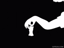 a gif from gifrun.com shows a white apple on a black and white background