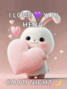 a bunny holding a heart that says i love you heba