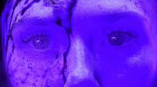 a close up of a person 's blue eyes