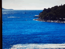 a blue ocean with boats in it and the date 2020 on the bottom right