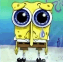 spongebob squarepants is crying with a tear coming out of his nose and eyes .