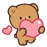 a teddy bear is holding a pink heart in its mouth
