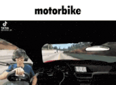 a video of a man driving a car with the words motorbike on the bottom