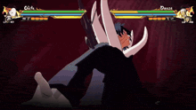 a video game screen shows a character named obito fighting another character named danze