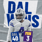 a football player holding a sign that says dal 40