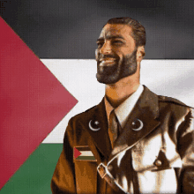 a man with a beard wearing a military uniform with a palestinian flag patch