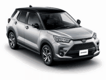 the toyota raize is a small suv with a black roof .