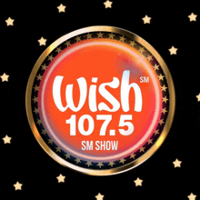 a wish 107.5 sm show logo with stars in the background