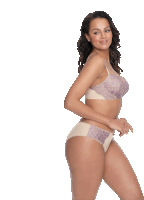 a woman is wearing a bra and panties with purple lace on the side