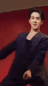 a blurry picture of a man in a suit dancing
