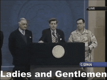 a ladies and gentlemen advertisement with a man giving a speech