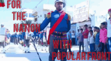 a man in a blue uniform stands in front of a crowd with the words " for the nation with popular front "