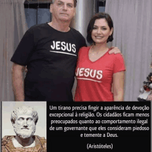 a man and a woman wearing jesus shirts are posing for a photo